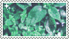 a gif of teal leaves with rain drops on them