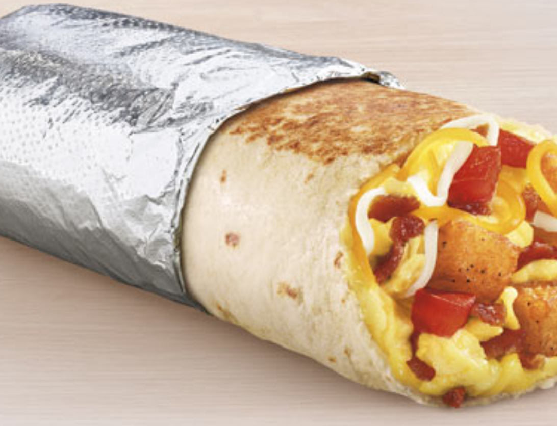 A picture of a grande toasted breakfast burrito with bacon